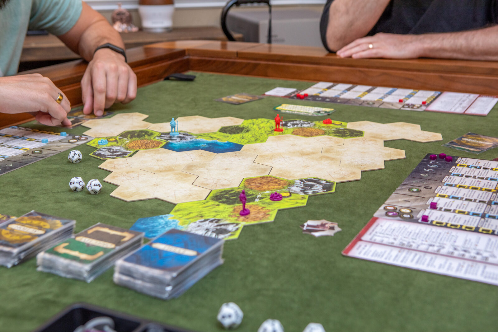 Clash of Cultures �� board in play with dice and card decks