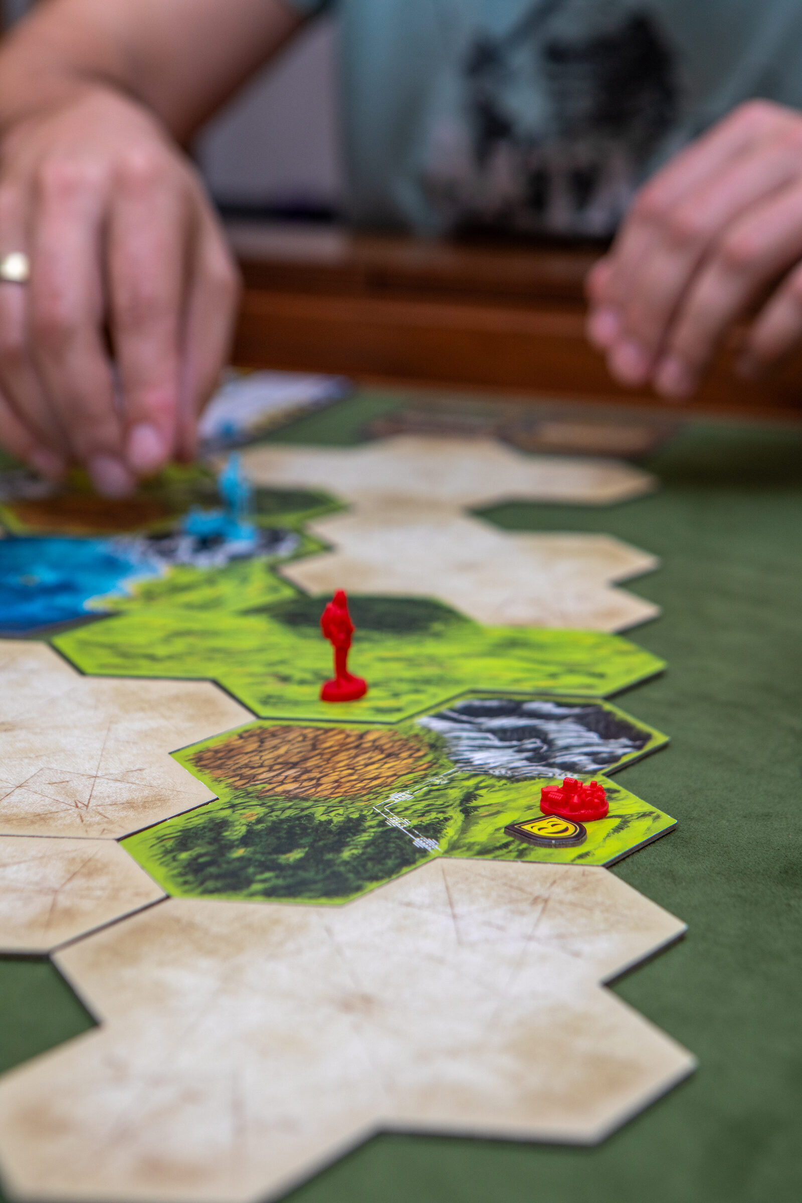 Clash of Cultures — close-up of colorful hex terrain and miniatures